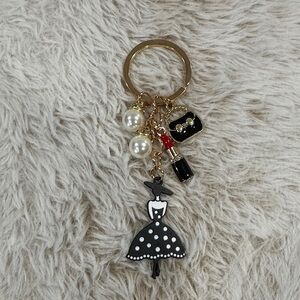 Elegant Black and Gold bag charm with Dress Charm